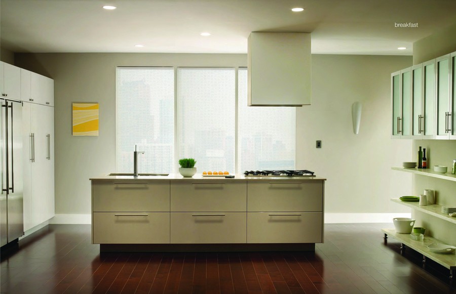 A condo kitchen featuring Lutron smart lights and motorized shades.